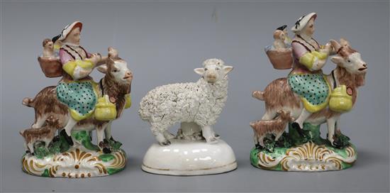 Two Staffordshire pottery figures of the tailors wife and a figure of a sheep Tallest measures 13cm
